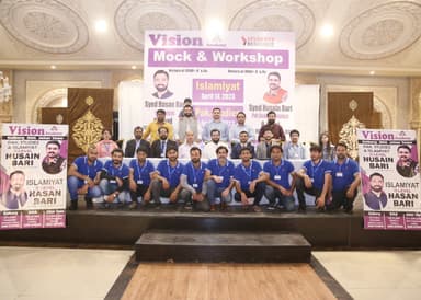Vision Academy Mock & Workshop — faculty and team on stage