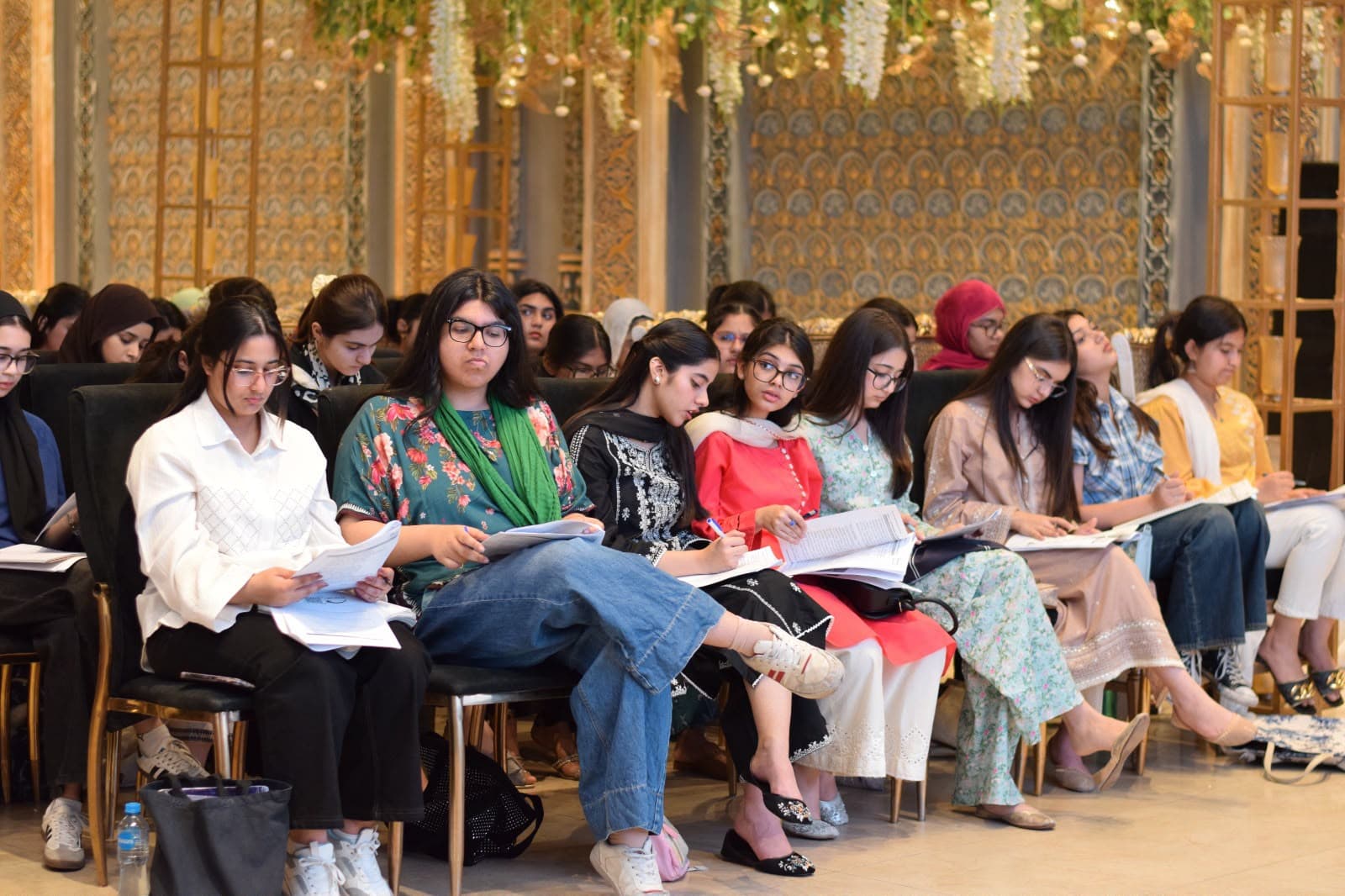 Sir Husain Bari delivering a workshop presentation